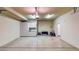 Spacious two-car garage featuring epoxy floor and ample storage space at 25 Luce Del Sole # 3, Henderson, NV 89011
