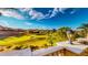 Expansive golf course views from the patio feature a manicured lawn, trees, and a clear blue sky at 25 Luce Del Sole # 3, Henderson, NV 89011