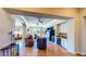 Open concept living room with wet bar, lots of natural light, and comfortable seating at 25 Luce Del Sole # 3, Henderson, NV 89011