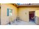 Private outdoor patio featuring lounge chairs and access to an interior room, perfect for relaxing at 25 Luce Del Sole # 3, Henderson, NV 89011
