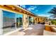 Spacious outdoor terrace with multiple access points and views of the surrounding landscape at 25 Luce Del Sole # 3, Henderson, NV 89011