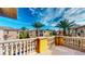 Inviting terrace with gorgeous views of nearby homes and lush palm trees at 25 Luce Del Sole # 3, Henderson, NV 89011
