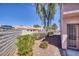Backyard with desert landscaping and view of the community at 2699 Aldonza Dr, Henderson, NV 89014