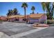Attractive single-Gathering home boasts a tile roof, desert landscaping, and a two-car garage at 2699 Aldonza Dr, Henderson, NV 89014
