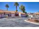 Alluring home featuring desert landscaping, a tile roof, and a convenient two-car garage at 2699 Aldonza Dr, Henderson, NV 89014