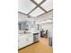 Another view of kitchen featuring stainless steel dishwasher and access to dining area at 2699 Aldonza Dr, Henderson, NV 89014