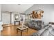 Open-concept living space with wood floors and a view into other areas at 2699 Aldonza Dr, Henderson, NV 89014