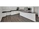 Spacious kitchen featuring stainless steel appliances, granite countertops, and ample cabinet space at 3221 Birdwatcher Ave, North Las Vegas, NV 89084