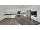 Spacious kitchen featuring stainless steel appliances, granite countertops, and ample cabinet space at 3221 Birdwatcher Ave, North Las Vegas, NV 89084