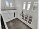 Open living area with soaring ceilings, clerestory windows, and wrought iron accents at 3221 Birdwatcher Ave, North Las Vegas, NV 89084