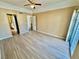 Open bedroom with laminate flooring, ceiling fan and outdoor balcony access at 3550 Bay Sands Dr # 2097, Laughlin, NV 89029