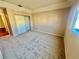 Bedroom with carpet, large window, and closet at 3550 Bay Sands Dr # 2097, Laughlin, NV 89029