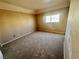 Bedroom with carpet, a large window, and neutral walls at 3550 Bay Sands Dr # 2097, Laughlin, NV 89029