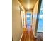 Hallway with wood flooring leading to bedroom with carpet at 3550 Bay Sands Dr # 2097, Laughlin, NV 89029