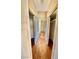 Hallway featuring wood flooring and closets with sliding doors on either side at 3550 Bay Sands Dr # 2097, Laughlin, NV 89029