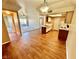 Cozy kitchen flows into living area with sliding glass doors and wood plank flooring at 3550 Bay Sands Dr # 2097, Laughlin, NV 89029