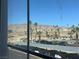 Views of parking and landscape from an interior window at 3550 Bay Sands Dr # 2097, Laughlin, NV 89029