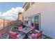 The backyard has pavers, rocks, and artificial grass, perfect for relaxing outdoors at 378 Rosefinch St, Henderson, NV 89012