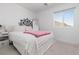 Comfortable bedroom offers soft textures, natural light, and mountain views at 378 Rosefinch St, Henderson, NV 89012