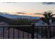 Stunning city views from the balcony, showcasing the skyline and distant mountains at dusk at 378 Rosefinch St, Henderson, NV 89012
