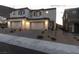 Inviting two-story home featuring a two-car garage, neutral paint, and desert landscaping at 378 Rosefinch St, Henderson, NV 89012