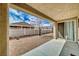Covered back patio overlooks a private, low-maintenance backyard with desert landscaping at 3891 Sedgwick, Pahrump, NV 89061