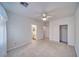 Spacious bedroom featuring neutral carpet, ceiling fan, and closet at 3891 Sedgwick, Pahrump, NV 89061