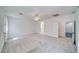 Large bedroom with plush carpeting, ceiling fan, and open doorway to bathroom and closet at 3891 Sedgwick, Pahrump, NV 89061