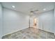 Bright bedroom with tiled floor, ceiling fan and an attached bathroom for comfort and convenience at 3891 Sedgwick, Pahrump, NV 89061