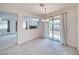 Dining area with soft carpet featuring sliding glass door and pass through to living room at 3891 Sedgwick, Pahrump, NV 89061