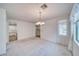 Cozy dining room featuring soft carpet and a decorative chandelier at 3891 Sedgwick, Pahrump, NV 89061