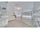 Clean, bright garage featuring built-in shelving, an automatic garage door, and lots of potential for storage at 3891 Sedgwick, Pahrump, NV 89061