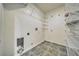 Walk-in closet shows shelving units and tiled flooring ready for organization at 3891 Sedgwick, Pahrump, NV 89061