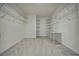 Spacious walk-in closet with installed metal shelving and carpeted floors at 3891 Sedgwick, Pahrump, NV 89061