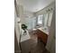 Well-lit bathroom with shower, single vanity, and stylish decor at 4107 Macadamia Dr, Las Vegas, NV 89115