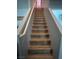 Well-maintained staircase with laminate flooring, providing easy access to upstairs at 4107 Macadamia Dr, Las Vegas, NV 89115