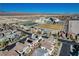 Aerial view of homes near the schools in a modern community with mountain views at 513 Founders Creek Ave, North Las Vegas, NV 89084