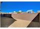 The backyard is gravel-filled and features a privacy fence at 513 Founders Creek Ave, North Las Vegas, NV 89084