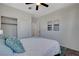 Comfortable bedroom with light blue decor, closet and soft carpet, creating a cozy atmosphere at 513 Founders Creek Ave, North Las Vegas, NV 89084