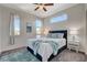 Comfortable bedroom featuring bright windows and soft decor, creating a serene atmosphere at 513 Founders Creek Ave, North Las Vegas, NV 89084