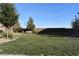 Lush green space features a bench and well-maintained lawn, ideal for relaxation and enjoying the outdoors at 513 Founders Creek Ave, North Las Vegas, NV 89084