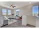 Cozy upstairs sitting area with large windows and stylish modern furnishings at 513 Founders Creek Ave, North Las Vegas, NV 89084