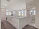 Spacious loft area with windows and access to bedrooms, complete with carpet flooring at 513 Founders Creek Ave, North Las Vegas, NV 89084