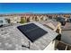 A modern home with solar panels on the roof to save money and help the environment at 513 Founders Creek Ave, North Las Vegas, NV 89084