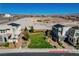 Neighborhood park between two modern homes in an aerial view of the community at 513 Founders Creek Ave, North Las Vegas, NV 89084