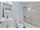 Bathroom features stylish vanity, toilet, and a shower/tub combo with sliding glass doors at 5162 S Jones Blvd # 106, Las Vegas, NV 89118