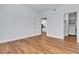 Bedroom showcases hardwood floors, open doorways, and light blue walls at 5162 S Jones Blvd # 106, Las Vegas, NV 89118