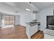 Open living area with wood floors, a sliding glass door and an open kitchen at 5162 S Jones Blvd # 106, Las Vegas, NV 89118