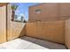 A private outdoor patio with stucco walls and concrete flooring at 5162 S Jones Blvd # 106, Las Vegas, NV 89118