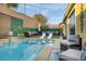 Enjoy the backyard oasis with its refreshing pool and an abundance of comfortable seating at 6021 Vista Clara St, Las Vegas, NV 89148